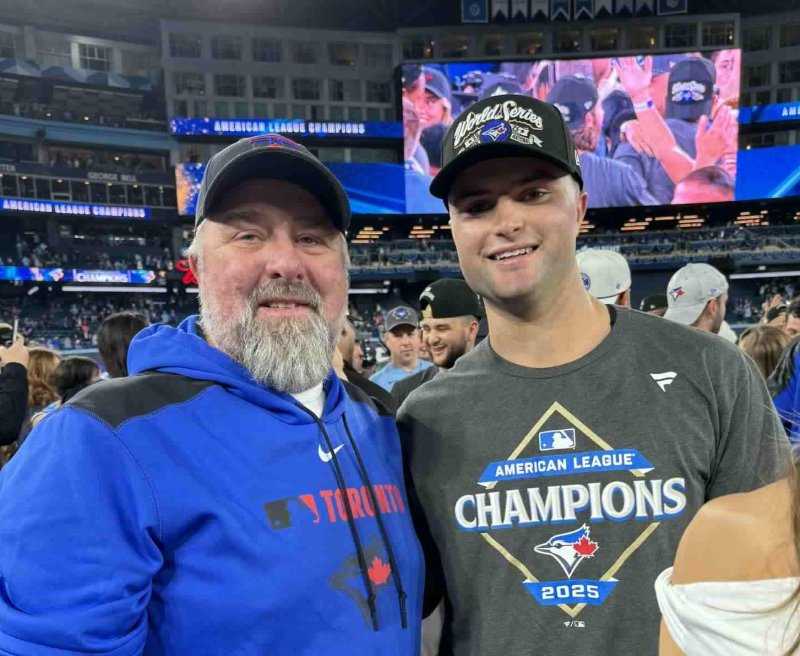 Lynn and Mason Fluharty after the Blue Jays clinched a trip to the World Series. SUBMITTED PHOTO